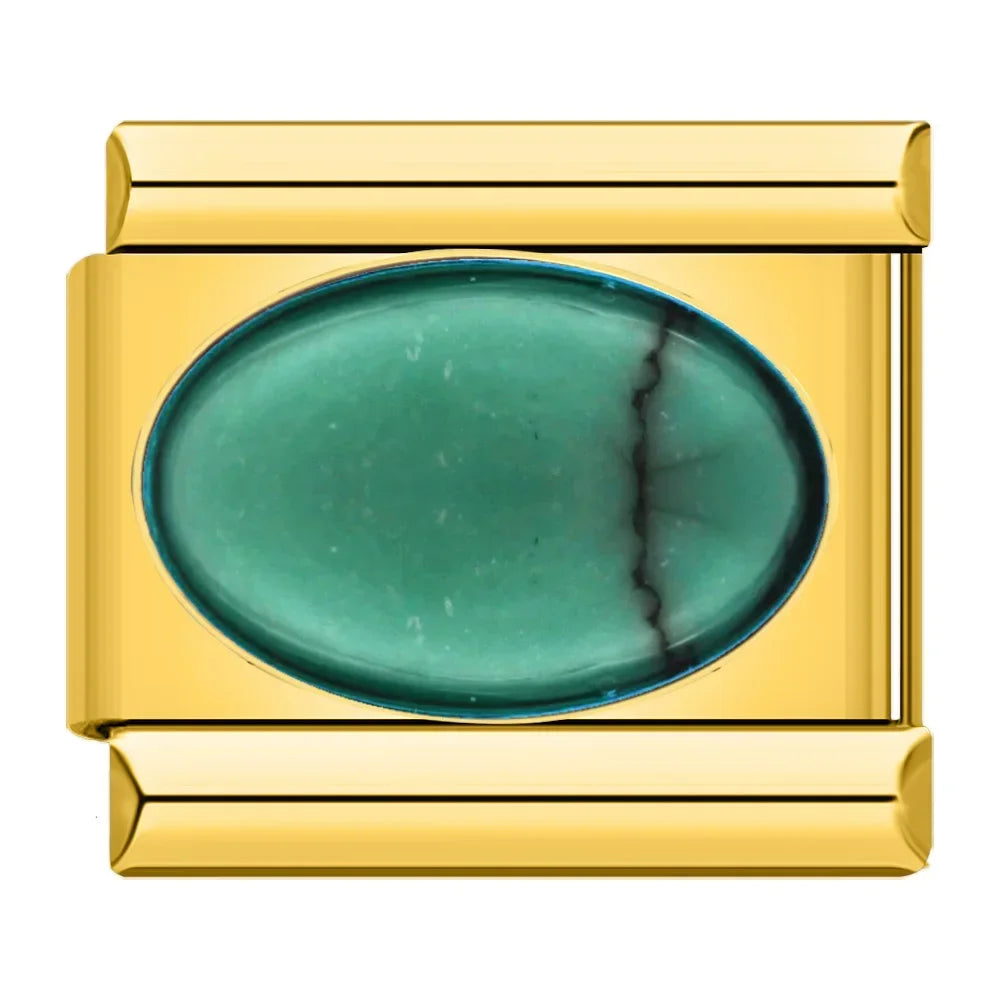 Oro con piedra verde